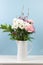 Cheerful bouquet on blue background