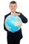 Cheerful boy in suit holding globe with both hands