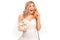 Cheerful bride talking on telephone