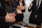 cheerful businessman applauding at conference. successful business team clapping hands for great work