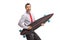 Cheerful businessman pretending to play guitar on a longboard