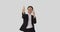 Cheerful businesswoman giving thumbs up gesture