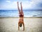 Cheerful caucasian young woman performing gymnastic working out