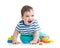 Cheerful child playing with colorful toy