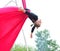 Cheerful child training on aerial silks