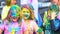 Cheerful children celebrate the colorful Holi festival.