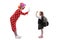 Cheerful clown gesturing high-five with a schoolgirl