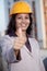 Cheerful construction engineer with thumb up gesture