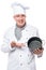 cheerful cook with an empty pan on a white background