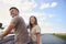 Cheerful couple catching a break during summer road trip