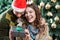 Cheerful Couple With Christmas Present In Store