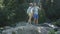 Cheerful couple of hikes enjoying panaromic view