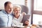 Cheerful couple resting in the cafe