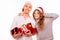 Cheerful cute couples holding red presents and smiling