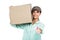 Cheerful delivery woman holding pack showing thumb up