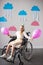 cheerful disabled girl holding balloons and smiling at camera