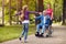 Cheerful disabled grandfather enjoying with his granddaughter an