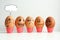 Cheerful eggs in a row, lined