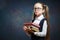 Cheerful Elementary Schoolgirl Hold Book Bunch