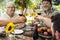 Cheerful family cheering with wine