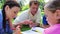 Cheerful family drawing together