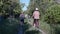 Cheerful family, grandson and his grandmother and grandfather lead an active lifestyle and enjoy joint ride on bicycles