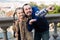 Cheerful father and daughter pointing at sight during sightseeing tour