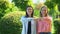 Cheerful female friends making fists-bump, glad to see each other, friendship