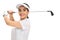 Cheerful female golf player swinging a golf bat