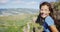 Cheerful Female Hiker With Windswept Hair At Diamond Head State Monument