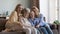 Cheerful female relatives of different ages, generations home portrait