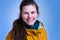 Cheerful, feminine woman smile in yellow, jacket. close up portrait of pretty caucasian young girl. cute brown haired