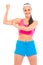 Cheerful fitness young girl showing her muscles