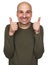 Cheerful funny bald man shows thumbs up