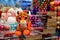 Cheerful funny tiger, Symbol of New Year 2022 on background of Christmas tree decorations in the store. Festive Christmas winter