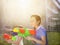 Cheerful girls playing water guns in the park