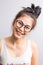 Cheerful glasses asian female model joyful