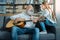 Cheerful grandfather singing for his adorable granddaughter