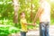 Cheerful grandparent and grandson walking outdoors