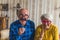 cheerful grandparents with cute glasses senior people support concept living room medium closeup