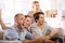 Cheerful group of friends watching football match