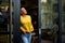 Cheerful happy satisfied smiling businesswoman or businessperson after a meeting. Adult person at the door of it`s house looking