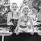 Cheerful healthy mother and daughter in swimming pool playing