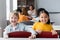 cheerful interracial schoolkids looking at camera