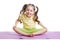 Cheerful kid girl doing exercises on fitness mat