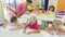 Cheerful kids sitting at school class