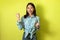 Cheerful Korean Female Gesturing Yes Standing Over Yellow Background