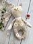 Cheerful linen textile toy cat by handmade, top view and sewing supplies