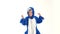 Cheerful little boy dancing fun on a white background in pajamas kigurumi, blue shark costume