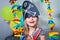 Cheerful little child in a pirate costume plays at home. Close-up. Children`s birthday party. Fun games at home with family.